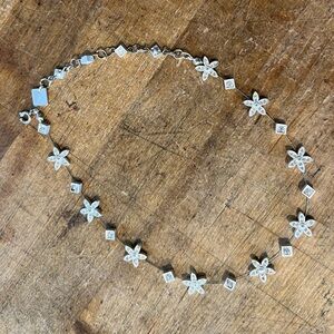 Silver and rhinestone choker necklace. Costume jewelry. 14” length.